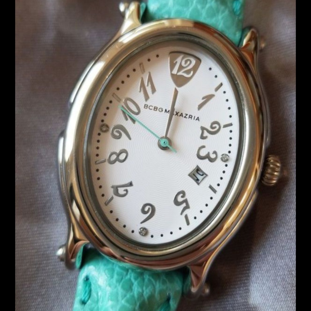 BCBG watch with leather strap and white face